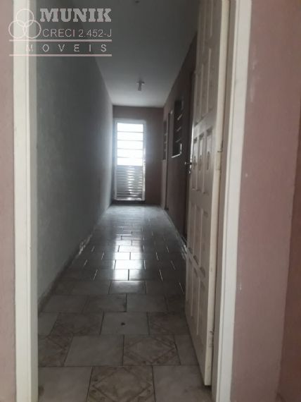 CASA TERREA 02 DORMITORIOS/02 VAGAS - R$ 420.000,00